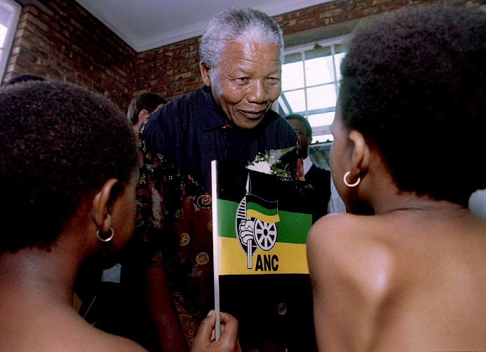 Image of African National Congress President Nelson Mandela dances